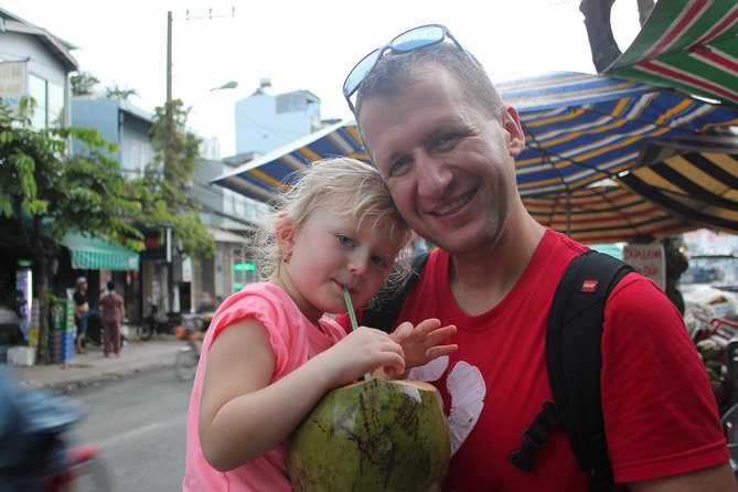 Afternoon Saigon Unseen Adventure by Scooter |Opt: Ao Dai Riders - Stop 4: District 4 floating market and life on boats