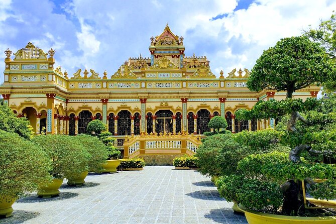 Authentic Mekong Delta: Tuk Tuk, Rowing Boat, Biking Tour - Vinh Trang Pagoda: the quiet cultural reset before the river