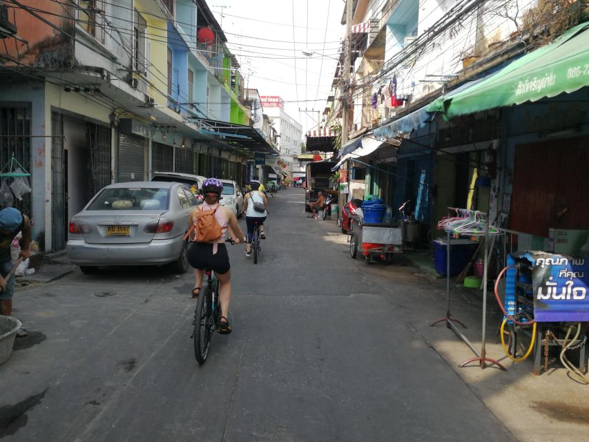 Bangkok: Bike and Canal Boat Tour with Lunch - Biking in Bangkok: Heat, Clothing, and Effort Tips for 210 Minutes
