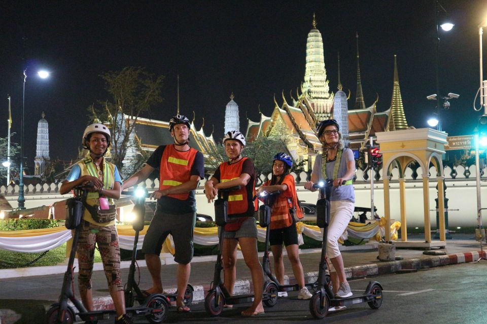 Bangkok: E-Scooter Night Tour with Local Street Food - Safety first: training, helmets, and how guides manage traffic