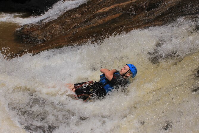 Canyoning Tour in Dalat Viet Nam - Rappel #1: an 18-meter descent beside a 30-meter waterfall