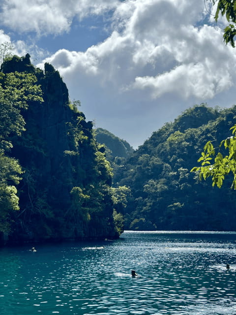 Coron: Private Boat Hire with Guided Tour and Lunch on Beach - Twin Lagoon and the kayak decision you should make early