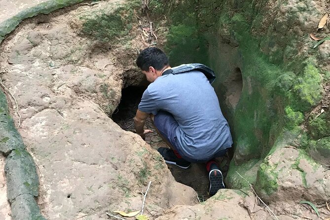 Cu Chi Tunnels tour In The Morning by DGT - Crawling Through the Tunnels: Small Openings, Big Perspective