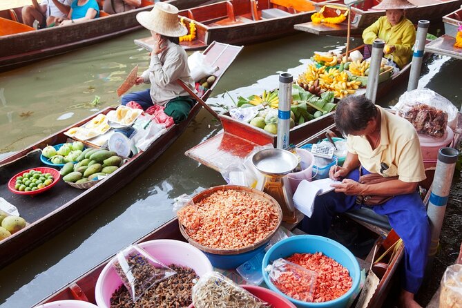 Damnoen Saduak Floating Market and Maeklong Railway Market Tour - Mae Klong Railway Market: the thrill is how close it gets