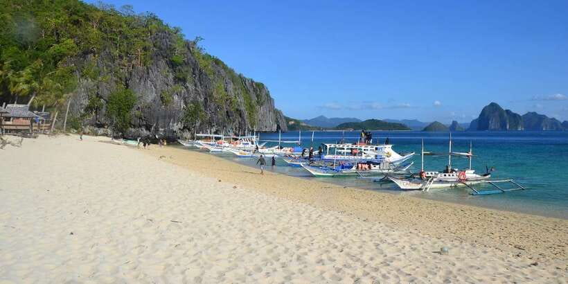 El Nido: Island Hopping Tour A Lagoons and Beaches - Seven Commandos Beach: White Sand and Coconut Shade