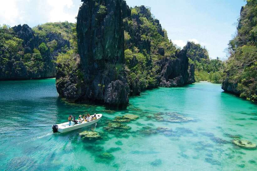 El Nido: Island Hopping Tour A Lagoons and Beaches - Secret Lagoon: Swim Under Jagged Rock Walls