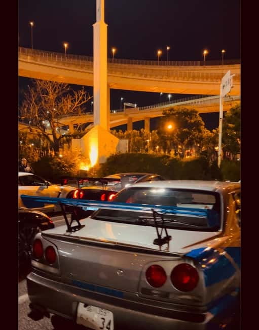 EVO, WRX, Skyline – JDM Night Run to Daikoku Car Meet - Autobacs Shinonome (A-pit): a quick shop break that actually fits the vibe