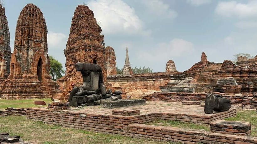 From Bangkok: Ayutthaya Heritage Tour with Sunset Boat Ride - Wat Chaiwatthanaram and the sunset glow across the river