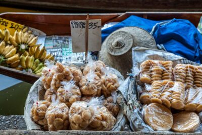 From Bangkok: Damnoen Saduak Floating Market Guided Tour - The Boat Portion: Paddle Boat, River Ride, and the Optional Long-Tail
