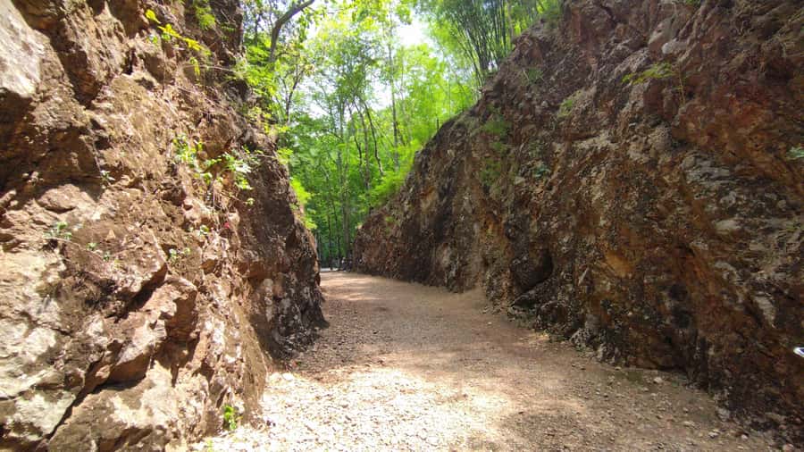 From Bangkok: Death Railway & Hellfire Pass Tour with Lunch - Kanchanaburi War Cemetery: quiet, well kept, and necessary