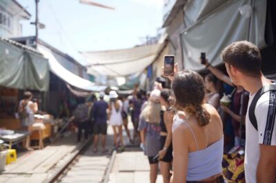 From Bangkok: Floating Market and Ayutthaya Guided Day Tour - Maeklong Railway Market: seeing stalls pull back for the train