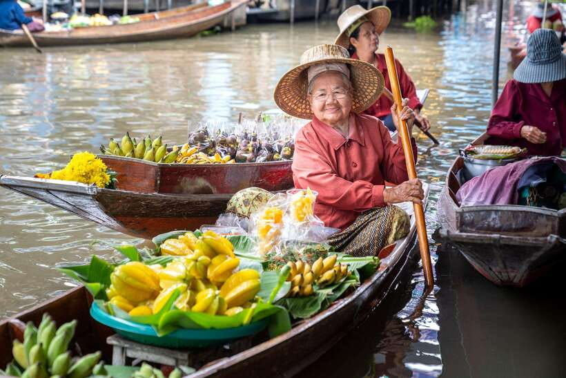 From Bangkok: Railway & Damnoen Saduak Floating Market Tour - Van transfer and the shift from rails to canals