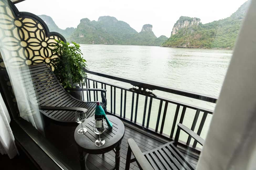 From Hanoi: 2-Day Cruise Trip with Private Balcony & Bathtub - Dark and Lights Cave: kayaking, bamboo boats, and a swim nearby