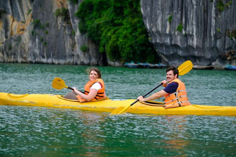 From Hanoi: 2-Day Halong Sapphire Cruise with Balcony Cabin - Sunset Party on Deck: Karaoke, Fruit, and Squid Fishing