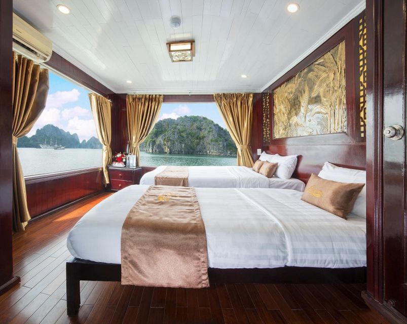 From Hanoi: Ha Long - Bai Tu Long Bay 2-Day 1-Night Cruise - Day 1: Cap La Island kayak and swim through karst