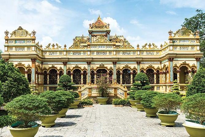 From HCM City: Mekong Delta Tour with Sampan Journey - Transport and comfort: air-conditioned bus, boat logistics, and timing