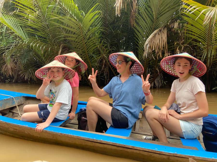 From HCM: Mekong Delta & Cai Rang Floating Market 2-Day Tour - Day 1: HCMC to My Tho and Ben Tre by pagoda, sampan, and village time