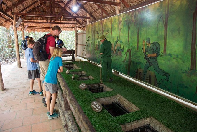 From Ho Chi Minh: Cu Chi Tunnels Half-Day History Tour with Guide - Walking the Tunnels and the Optional Shooting Activity