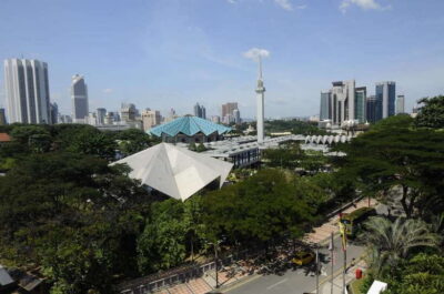 From Kuala Lumpur: Batu Caves Cultural Temple Tour - Riding past Little India and Brickfields: you get the city context fast