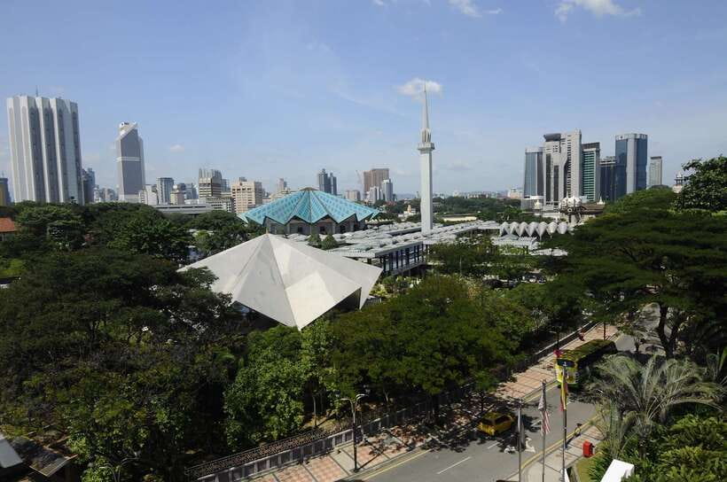 From Kuala Lumpur: Batu Caves Cultural Temple Tour - Riding past Little India and Brickfields: you get the city context fast