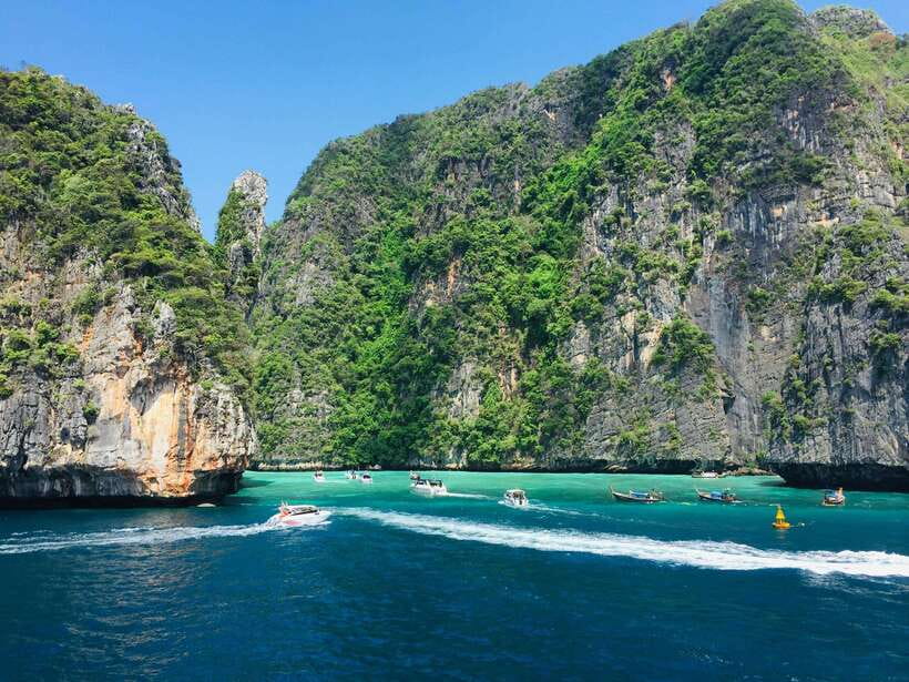 From Phi Phi: Full Day 7 Island Tour by Longtail with Sunset - Price and budgeting: $35 plus the 400 THB national park fee