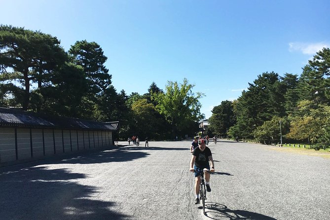 Full Day Biking Tour Exploring the Best of Kyoto - Nishi Honganji and Kitano Tenmangu: old wood, local rituals, quiet mood