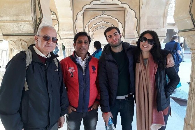 Full-Day Jaipur Private Sightseeing Tour by Car with Guide - Jal Mahal and Hawa Mahal: lake views and palace-with-a-job
