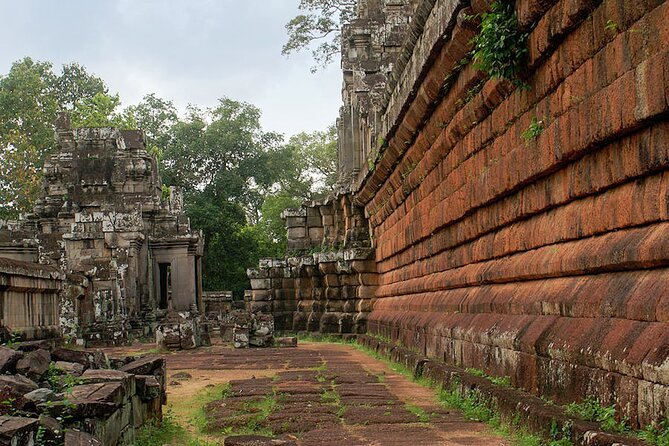 Full Day Small Group Tour Guide with Sun rise - Angkor Thom South Gate: Carved Faces and a Causeway Feel