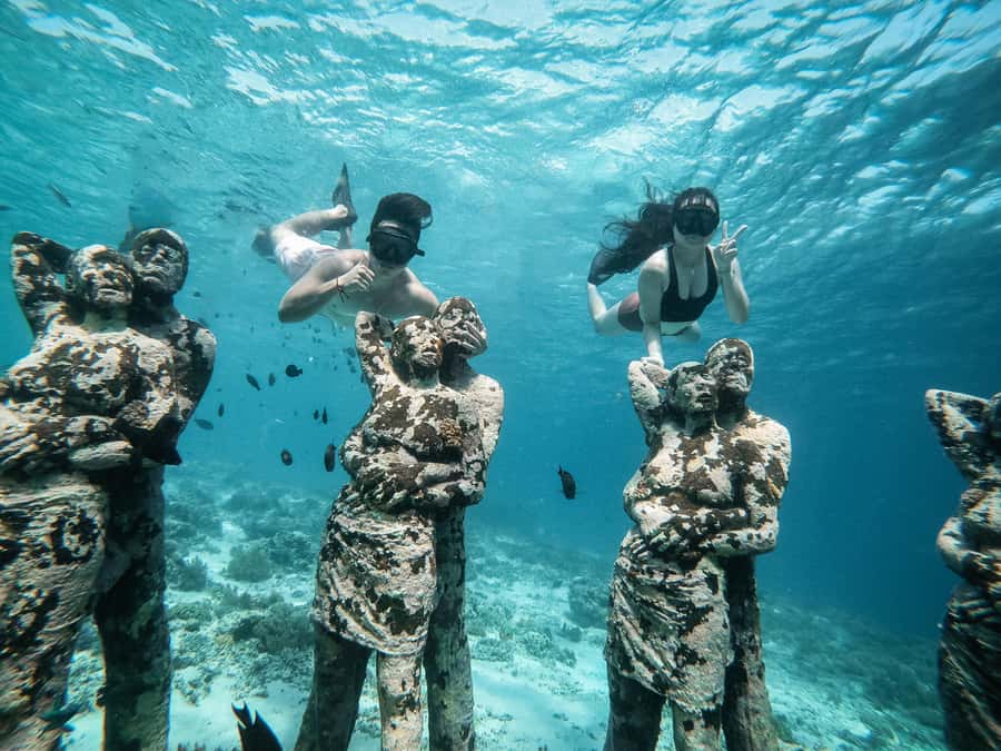 Gili Trawangan: Gili Islands Sunset Boat Tour and Snorkeling - Glass-bottom boat viewing: the coral show before you swim