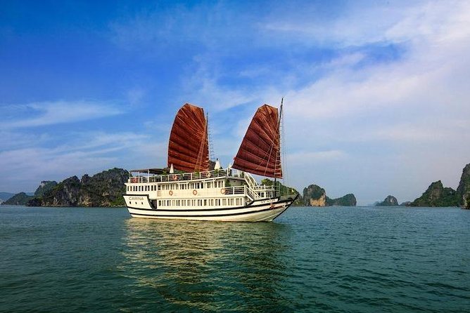 Halong Bay 2 Days 1 Night Cruise - Day 1 on the water: check-in, lunch, Titop Island, and the evening flow