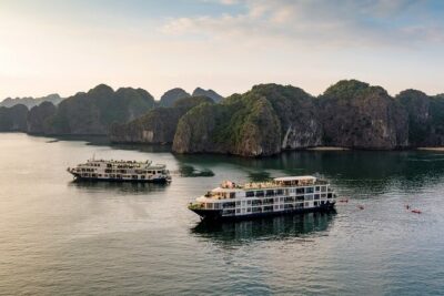 Halong Bay Cruise 2 days 1 night from Hanoi included transfer - Day 1 on the Water: Cave Sculptures, Beach Time, and Cabin Comfort