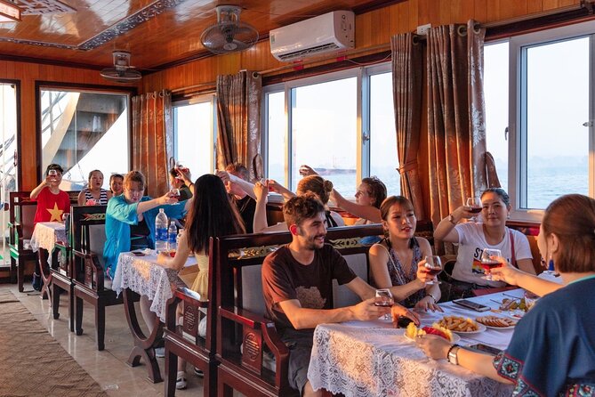 Halong Bay Day Tour With Titop Island, Cave, Kayak & Lunch - Sung Sot Cave: the big cave stop and what to expect