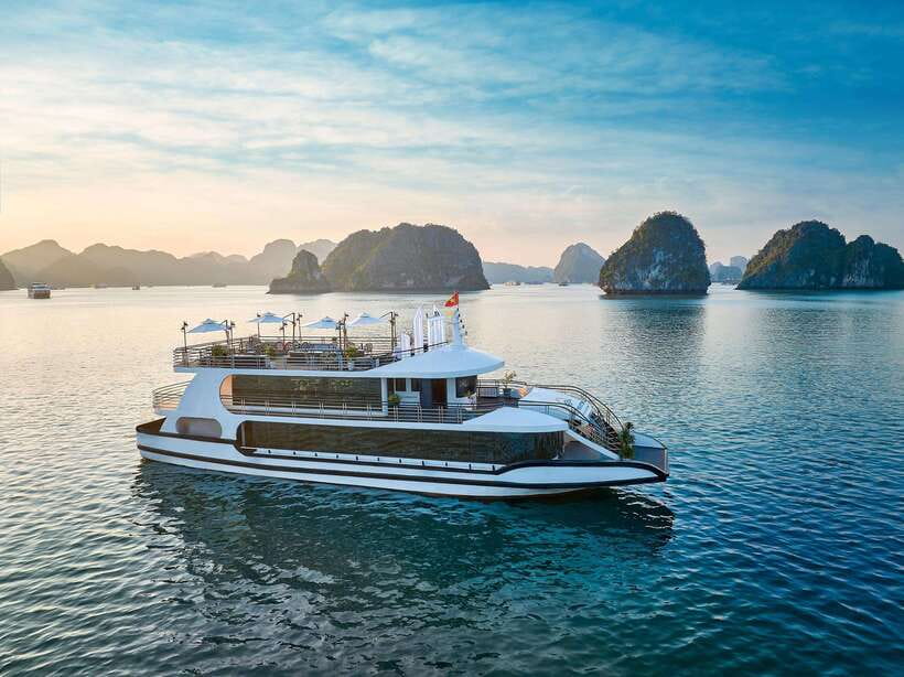 Halong Bay: Luxury Day Cruise with Buffet, Kayak, Swim - First Major Caves: Surprising Cave (Sung Sot) Photo Stops With Real Shapes