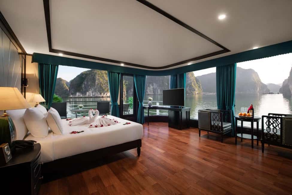Hanoi: Aspira 5★ Overnight Cruise w/ Balcony & Free Transfer - Dark & Light Cave: kayaking or bamboo boat, plus the crowd reality