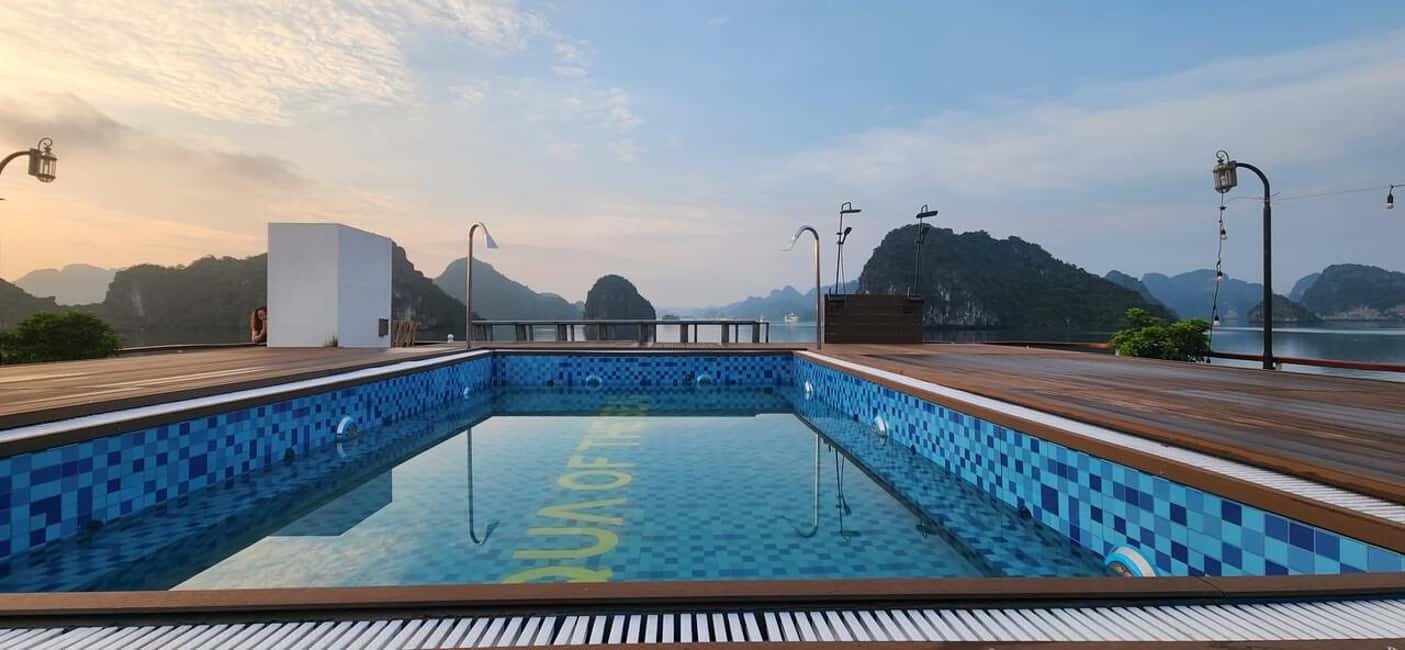 Hanoi: Aspira 5★ Overnight Cruise w/ Balcony & Free Transfer - Check-in on the ASPIRA Cruise: balcony suite life and the basics