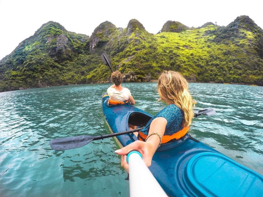 Hanoi: Halong Bay Day Trip with Titop Island, Cave, & Kayak - Luon Cove kayaking or bamboo rowing: calm water with real effort