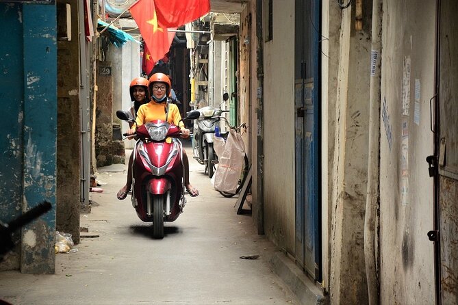 Hanoi Motorbike Tours Led By Women: Hanoi City Insight Motorbike Tours - Hữu Tiep Lake and the Downed B-52: a stop with real weight
