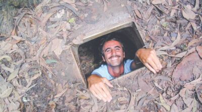 Ho Chi Minh City: Cu Chi Tunnels and Gun Shooting Experience - Beyond the tunnels: bomb craters and a museum of self-made weapons