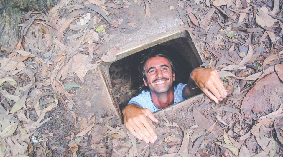 Ho Chi Minh City: Cu Chi Tunnels and Gun Shooting Experience - Beyond the tunnels: bomb craters and a museum of self-made weapons