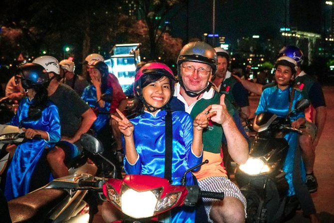 Ho Chi Minh Night Tour by Motorbikes with Female Rider | KissTour - Small Group Energy: Why Up to 15 Matters at Night