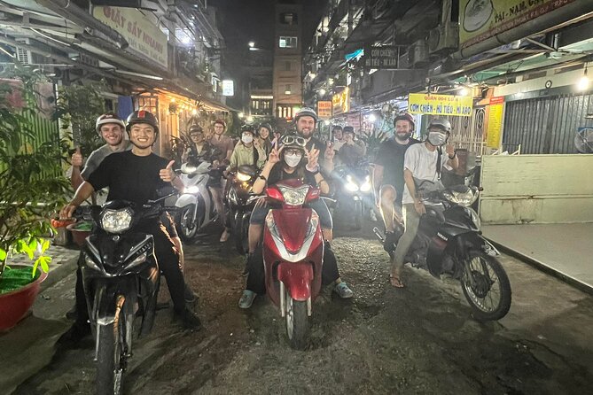Ho Chi Minh Street Food Tour By Motorbike (Unique & Authentic) - Scenic stop across Ba Son Bridge and the District 1 skyline views