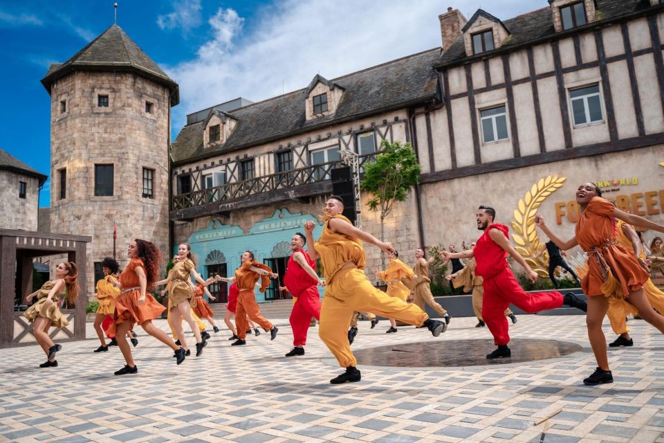 Hoi An/Danang: Bana Hills and Golden Bridge Small Group Tour - The French Village: Street Music, Statues, and a Carnival-Style Show