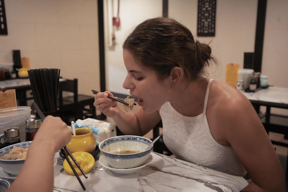 Hong Kong: Street Food Tour with Locals - Dim Sum and Wonton - Wing Lok Street: Dried Seafood Luxury Meets Real Neighborhood History