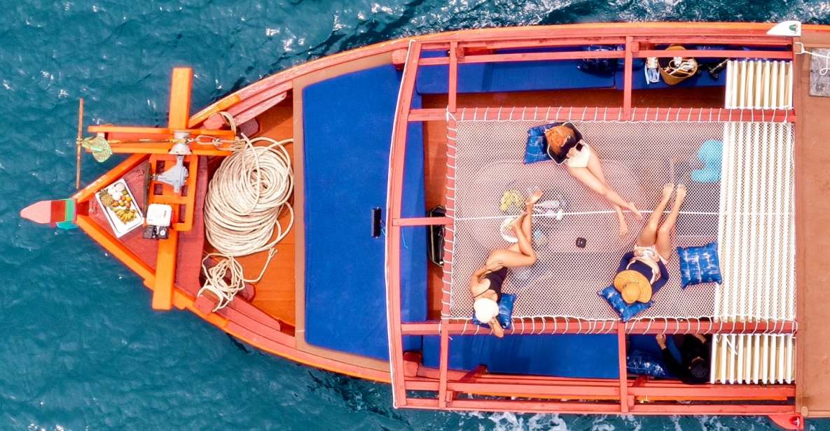 Ko Tao: Tao-Nangyuan Snorkeling Day Trip with Meals & Sunset - Shark Bay: where you go a bit deeper for turtles and blacktip reef sharks