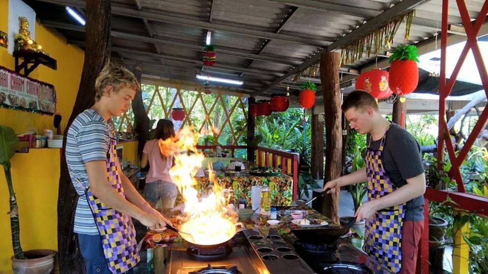 Krabi: Cooking Class at Thai Charm Cooking School with Meal - Curry Paste to Curry Plate: Green, Red, and Phanang Logic