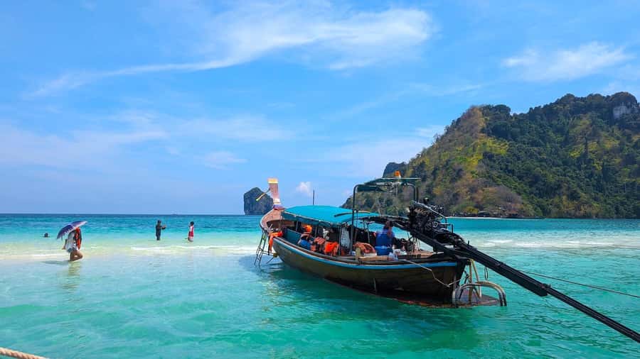 Krabi: Island Hopping Tour by Private Longtail Boat - Weather and sea conditions: rain is possible, waves are the real variable