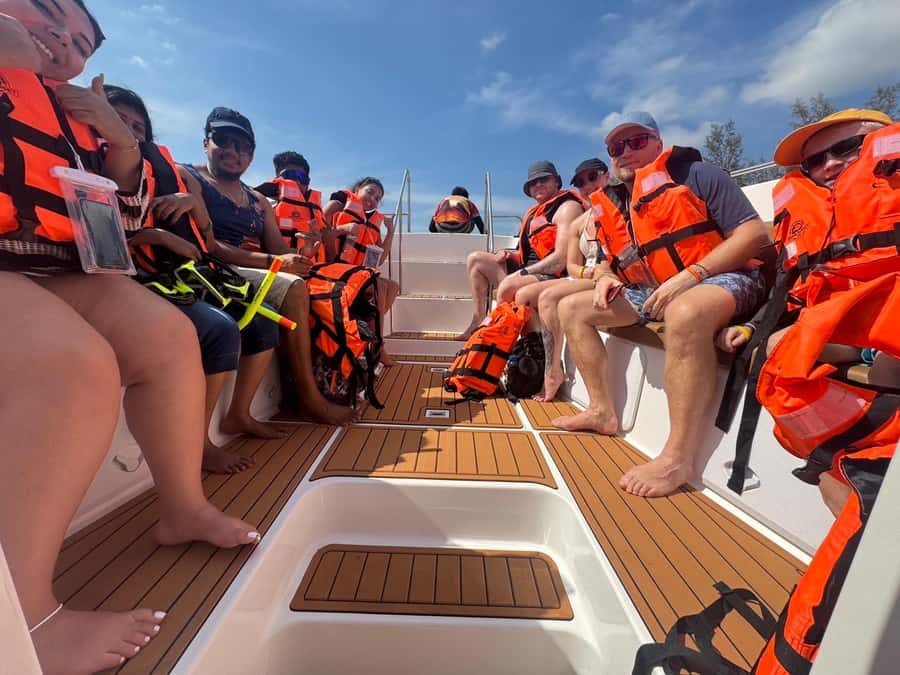 Krabi: Phi Phi Island Sunset Maya Bay and Four Islands Tour - Pileh Lagoon Swimming: Where the Water Does the Talking
