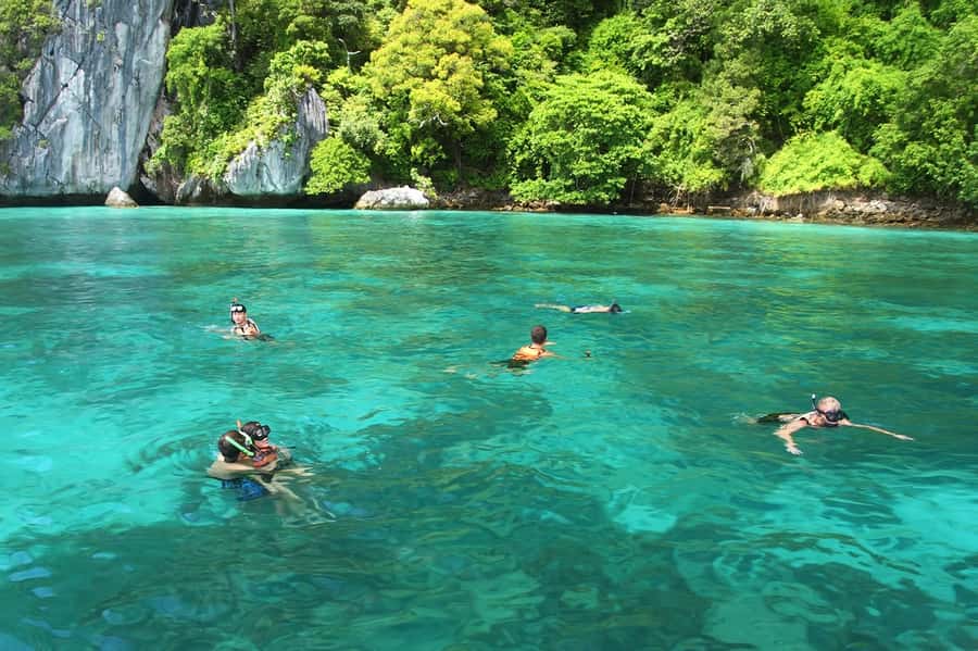 Krabi: Phi Phi Island Sunset Maya Bay and Four Islands Tour - Loh Samah Bay Wooden Trail to Maya Bay: Timing, Rules, and the Best Viewing Moment