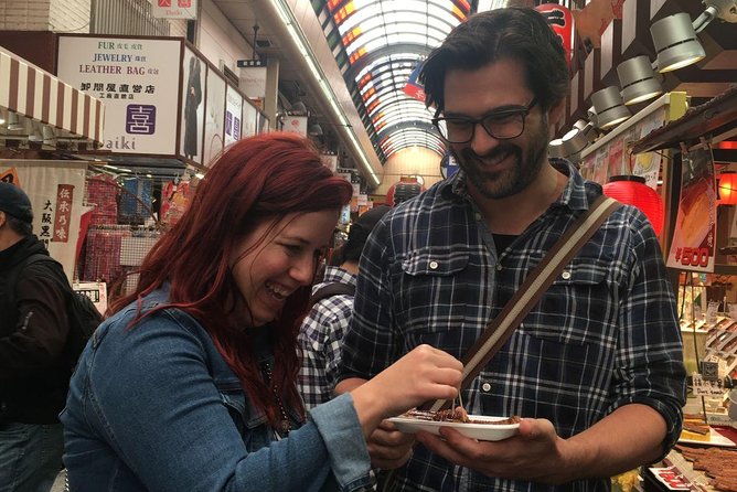 Kuromon Market Food Walking Tour in Osaka (6 stops, 6 tastes) - Namba Grand Kagetsu, Namba, and Dotonbori: the city’s showtime walk