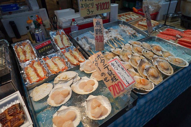 Kuromon Market Food Walking Tour in Osaka (6 stops, 6 tastes) - Stop 1 at Kuromon Market: the easiest place to learn what to order